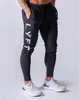 MarchWind العلامة التجارية مصمم للركض السراويل الرجال الرياضة Sweatpants تشغيل الرجال ركض القطن Trackpants سليم صالح السراويل كمال الاجسام بنطلون