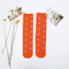 Calcetines de bebé para niños y niñas, medias con estampado Floral para niños, calcetines hasta la rodilla con flores de Color caramelo, medias de princesa encantadoras de algodón para niñas CYP806