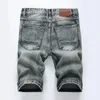 Jeans maschile maschili dritti shorts in jeans strappato nuovo stilista estivo per uomo color hip hop biker jean shorts42