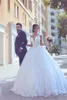 كرات جديدة فساتين الزفاف غارقة ضد الرقبة قال Mhamad Gridal Grown Lace Lace Court Court Train Vintage Aribic Wedding Bride Dride