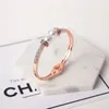 Bracciale con zirconi intarsiati di perle esagerate dal design creativo, braccialetto da sposa in oro rosa di moda di lusso squisito, braccialetto regalo di gioielli per le vacanze