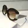 Luxury-811 Solglasögon för Kvinnor Designer Snake Läderben Enkel UV-skydd Beläggningslins Klassisk Oval Frame Toppkvalitet med förpackning