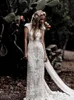 V Szyjki na szyi bohemian pełne koronkowe sukienki ślubne Country Boho Sukienki ślubne zamiatanie pociągu Syrenka Vestidos de novia Brides Recepcja Suknie Plus Rustic AL3184