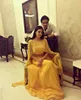 Romantic 2019 Indian Prom Dresses with Shiny Beaded Sequined Cape Sexy Two Pieces A Line Floor Length Yellow Chiffon Belly Dance Costume