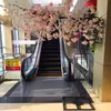 白い人工桜の木の道路鉛シミュレーションウェディングパーティー用の鉄のアーチフレーム付きチェリーフラワープロップ9999142