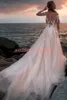 Stunning Sheer Blush Pink 2019 Wedding Dresses With Long Sleeve Lace Bridal Gowns Illusion A-Line African robe de mariée Bride Dress Ball