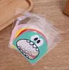 Nuevo 100 Uds. Bolsas de plástico autoadhesivas con bonito monstruo de dibujos animados CookieCandy para galletas, aperitivos, suministros para hornear, decoración navideña