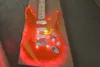 Guitare électrique à corps acrylique léger à LED orange avec petit pont de trémolo, micros SSS, peut être personnalisé