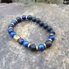 SN0370 Hombres más calientes Pulsera de oro Pulsera de cabeza de Buda Pulseras de cuentas de lapislázuli Mala Yoga Pulsera de cuentas de piedra