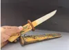 Peinture à la main du Tibet, sculpture sur os, couteau de taille, épée en bois