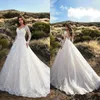 2020 Vestidos de novia modestos Apliques de diamantes de imitación Con cuello en v Mangas largas Vestidos de novia Dubai Arabia Saudita Una línea Vestido de novia Vestido De Novia