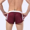 Mesh Running Shorts Men Penis Torebka Shorts Mężczyźni luźne kieszeń letni dom wolny sport szybki sucha seksowna bokser