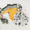 Tjejer kläder barn blommiga blommor kläder uppsättningar baby ruffle rompers kjol huvudband outfits ins fasta jumpsuit tutu kjolar hårband set c6785