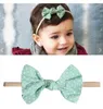 cheveux bébé fille Bows cheveux en nylon Photographie florale Bandeau Accessoires cadeau d'anniversaire 10pcs / carte