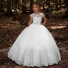 Lovey Holy Lace Princess Flower Girl Dresses Ball Gown Abiti da prima comunione per ragazze senza maniche Tulle Abiti da spettacolo per bambini282Y