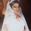 Saudi Arabic Dubai Gorgeous Ball Gown Wedding Dresses Cap Sleeve Crew Neck Lace Appliques Sequins Long Bride Formal Wedding Gowns