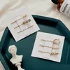 3pcs / set kvinnor hairpins hårklipp pärla bobby pins sida bangs clips barettes headwear damer mode hår verktyg smycken tillbehör nytt