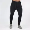 Mens Jogger Fitness Calças Casuais Estiramento Algodão Mens Fitness Exercício Bordado Calças De Esportes Calças Jogging Asiático Tamanho M-2XL