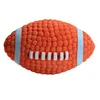 Verão novo fabricante de vendas diretas pet multi-color bola de brinquedo de látex interativo dentes bola vocais Rugby limpo agente de suporte