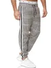 سروال رجالي جديد Houndstooth طباعة ذكر المشارب الجانبية اللون مطابقة يتأهل Sweatpants ركض بنطلون رياضي وزرة