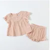 Niños bebés fija de verano de manga corta T camisa cortocircuitos 2pcs sólido de la manera Traje volante Algodón 2020 Nuevo Diseño Boutique de la ropa Establece ZYQ352