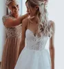 ビーチのウェディングドレス2020背中のレースのアップリケ真珠のスパゲッティストラップAラインBoho Bridal Gowns Robe de Mariee安い