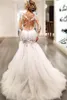 Wunderschöne Spitze-Meerjungfrau-Hochzeitskleider 2019 Dubai im afrikanischen arabischen Stil, zierliche, lange Ärmel, Brautkleider in Übergröße