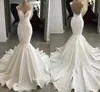 2019 Abiti da sposa in pizzo Sheer Jewel Neck Sexy Backless Sweep Train Appliques in raso Abito da sposa a sirena Plus Size Abiti da sposa