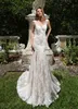 2020 Bohemian Mermaid Wedding Dresses V Neck Floral Appliqued Beaded Bridal Gown Sleeveless Sweep Train Lumbar Vestidos De Novia