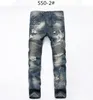 Berömda varumärkesdesigner män jeans rippade jeans blå rockstjärna mens jumpsuit designer denim manliga byxor 8862295h