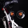 TX129 Fanale posteriore per bicicletta intelligente a 64 led 80 lumen Batteria 1200mAh Indicatore di direzione automatico Luce laser a infrarossi - Nero