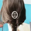 Topkwaliteit legering parel dames haarclip luxe haaraccessoires clip achterkant van het hoofd zijclip1859330