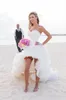 Sexig Hög Låg 2019 Ny Sommar Sweetheart Neckline Elfenben Ruffled Organza Kort framsida Långt Back Corset Bridal Gowns Beach Bröllopsklänningar