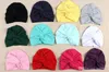 New Europe Fashion Infant Baby Hat Kids Kink Knot Caps Solid Color Biggin Girls Children Skull Cap Hats A628