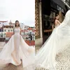 Vestidos de novia elegantes de sirena 2020 con tren desmontable, vestidos de novia de encaje con cuello transparente, vestido de novia de playa bohemio ajustado personalizado