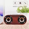 Q8 Double Horn 4.2 Bluetooth Wireless Speaker دعم اتصال كابل Aux وتشغيل بطاقة TF للهاتف الذكي / الكمبيوتر اللوحي / MP3 خشبي