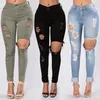 Jeans strappati neri per le donne Pantaloni a matita in denim Pantaloni Jeans skinny elasticizzati a vita alta Jeggings strappati Taglie forti mamma 20207639334