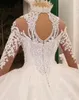 2020 Dubai Luxury Crystal Beaded Applique Lace Ball Gown Wedding Dress High Neck Sheer Långärmad Hål Back Vestido de Noiva Bride Dress