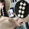 4 orecchini lunghi con frange di perle pendenti con perle di conchiglia bianca, orecchini con fascino femminile