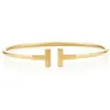 NUOVO regalo di fascino argento sterling 925 Golden T Logo TF braccialetto di temperamento attraente gioielli del mondo