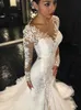 Wunderschöne Spitze-Meerjungfrau-Hochzeitskleider 2019 Dubai im afrikanischen arabischen Stil, zierliche, lange Ärmel, Brautkleider in Übergröße