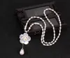 Naszyjnik perłowy łańcuch swetrów długi kwiat Pearl Pendant Women039S Moda wisiorek 4961268