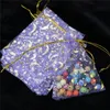 HotSale 100PCS / Lot Moon Star Wraps Organza Väskor 7x9 9x12cm Små jul Drawstring Presentväska Charm Smycken Förpackning Väskor Påsar