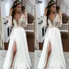 Vita eleganta Boho -klänningar långärmad spetsar applikationer sidoslits tyllklänningar ny elfenben land strand bröllop klänning