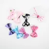 Dziewczyny Cute Bow Tie Hairclips 100 sztuk / Zestaw Kreskówka Kwiatowe Paski Włosy Klipy Kids Designer Akcesoria do włosów Drukowane włosy kokardki do włosów M1796