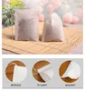 1000Pcslot 56cm Tea Bag Filter Paper Bags Heat Seal Teabags Tea Strainer Infuser Wood Drawstring for Herb Loose Tea1097765