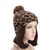 Moda Kadınlar Leopar Faux Kürk Topu Kış Sıcak Tığ Örme Şapka Kap Beanie Kadınlar Için Şapka Gorras
