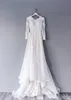 Abiti da sposa con applicazioni di pizzo floreale modesto 3D con maniche lunghe Collo gioiello Primavera Boho Abiti da sposa da giardino Sweep Train Spose formali Robes de Mariee AL3228