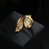 トレンディな女性の宝石類の手作りの立方体ジルコニアバタフライウィングズの結婚指輪を女性のビジュール