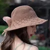 Vacanze estive Protezione solare Accessori Ragazza Cappello traspirante Visiera da spiaggia Moda pieghevole Scava fuori i cappucci Bowknot Spedizione gratuita